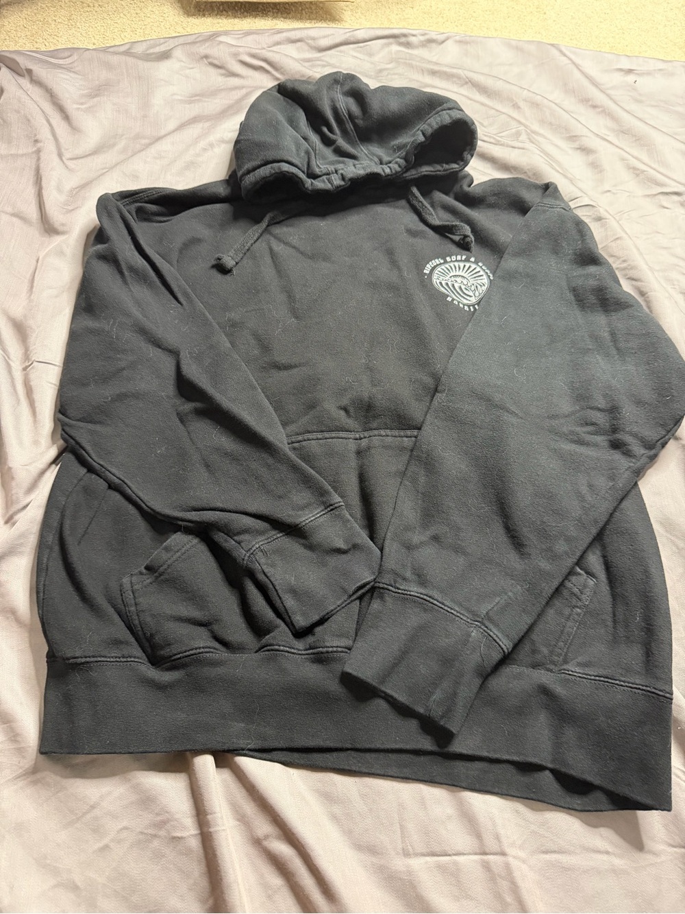 Rip Curl Black Hoodie with White Surf Emblem